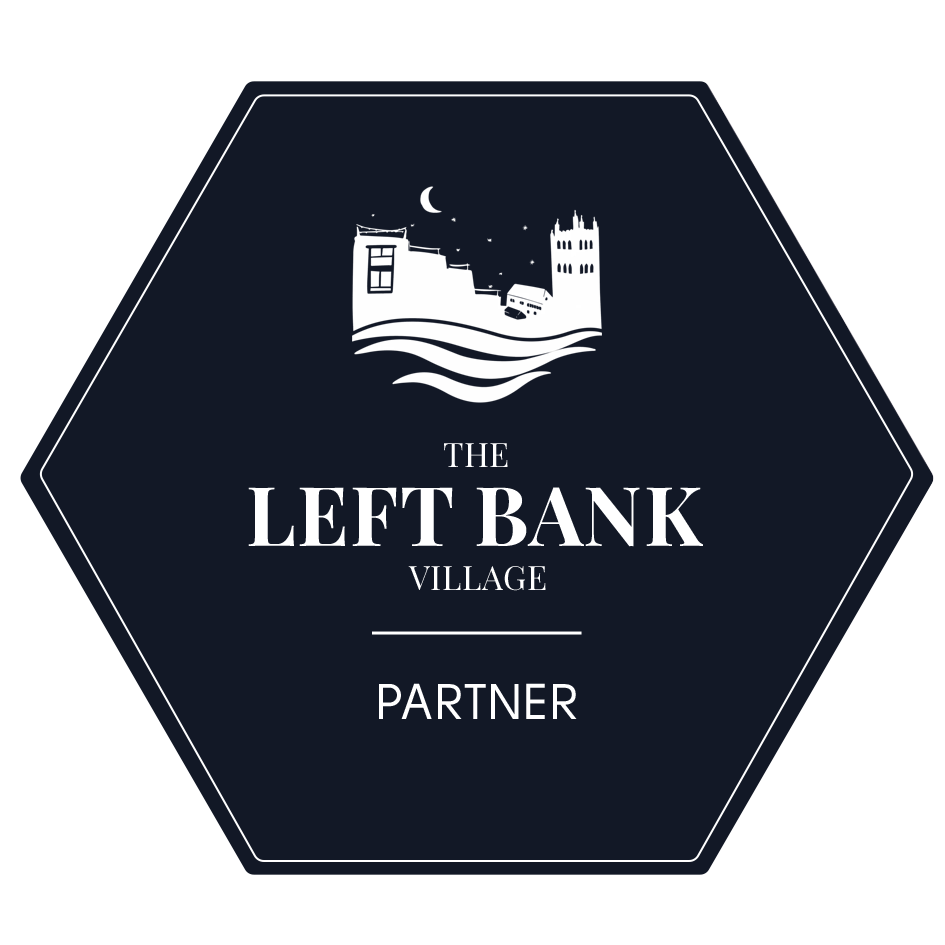 The Left Bank Village Partner Crest